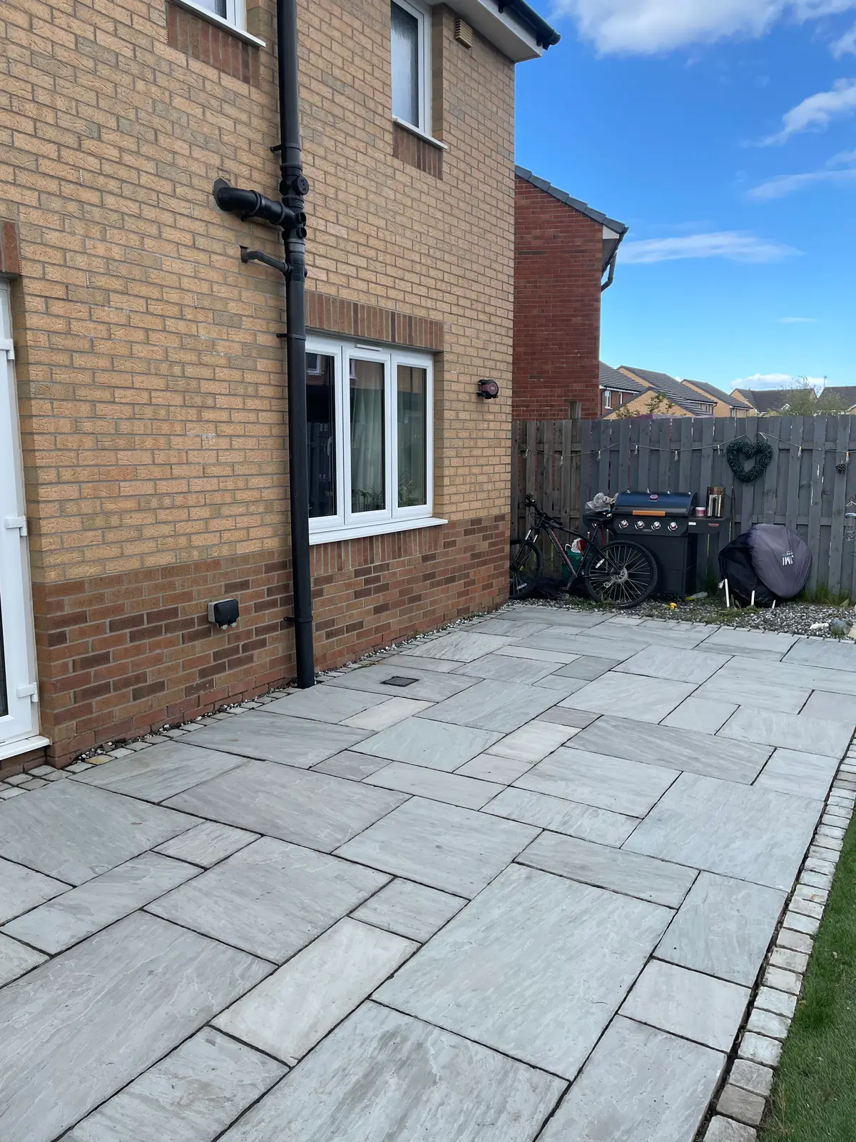 A freshly cleaned flagstone patio